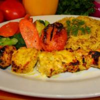 Broiled Chicken Kabob (Breast) · Rotisserie broiled and served with roasted tomato, sautéed vegetables, and vermicelli pilaf.