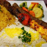 Broiled Kabob Trio · A sampling of our three most popular kabobs. Marinated chicken, lamb and koobideh (ground be...