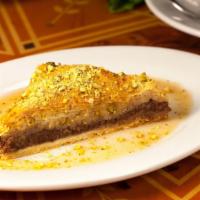 Mama'S Baklava · Made fresh from our finest fillo dough, stuffed with fresh crushed walnuts, almonds, butter,...