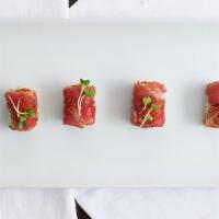 29Th Roll · Spicy tuna, avocado, seared tuna and garlic butter. Eight pieces per order.