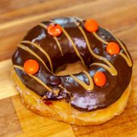 Reese'S Doughnut · Chocolate icing with Reese's Pieces and Reese's peanut butter drizzle.