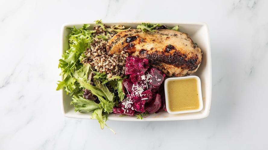Beet 'N Chicken Salad · mixed greens, roasted chicken breast, roasted beets + aged feta, lemon chive quinoa, kaffir lime vinaigrette (contains dairy)