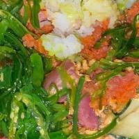Aloha Tuna · Ahi tuna, spicy tuna, cucumber & seaweed salad, edamame, red onion, ginger, crispy garlic, s...