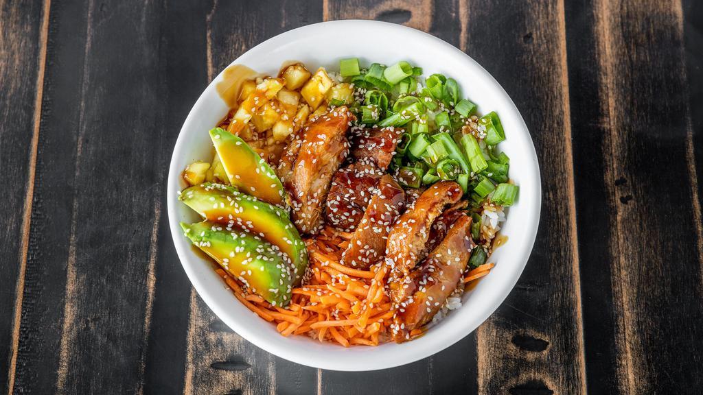 Sticky Pineapple Chicken Plate · (Spicy) A fiery blend of sweet and spicy. Fried chicken bites tossed in sticky spicy pineapple sauce and garnished with black sesame. Served with spring roll, sunomono salad, and choice of rice.