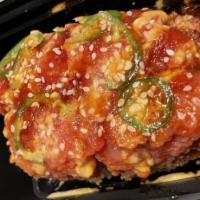 Spicy Tuna Crispy Rice · (Spicy) Crispy fried sushi rice topped with fresh spicy tuna, eel sauce, and spicy mayo. Gar...