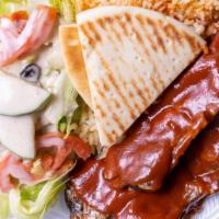 3 Piece Ribs · Pork Ribs with BBQ sauce served with Pita Bread, Garden Salad and your choice of Rice, Pinto...