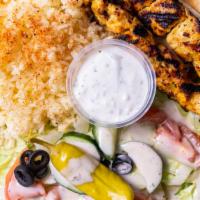 Double Chicken Kabob · Double Chicken Kabob served with Pita Bread, White Sauce, Garden Salad and your choice of Ri...