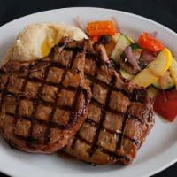 Pork Chops (Dinner) · Blackened (spicy) or grilled 8oz center cut pork chops (2) served with vegetable medley and ...