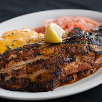 Blackened Catfish (Dinner) · Blackened catfish fillets (2), seasoned to perfection, served with tomatoes vinaigrette and ...