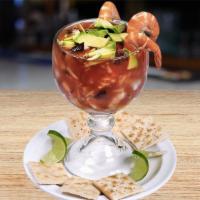 Vuelve A La Vida · Cured shrimp cooked shrimp, octopus, fish, oysters, scallops, tomato, cucumber, onion and co...