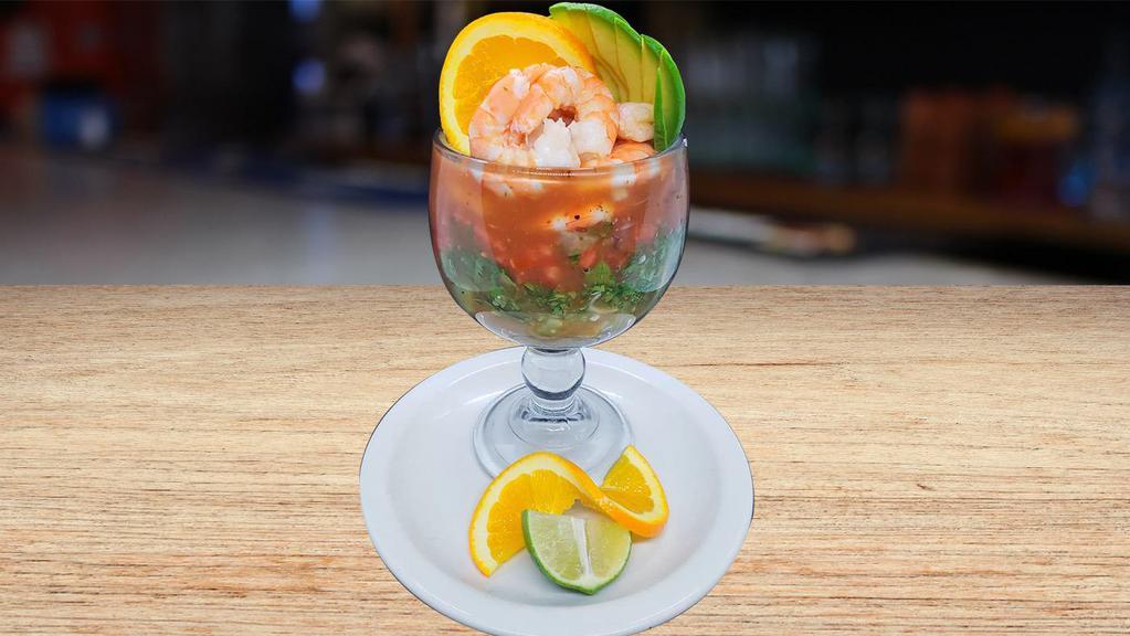 Coctel De Camaron · Cooked shrimp with tomato, cucumber, onion, coriander with special sauce.