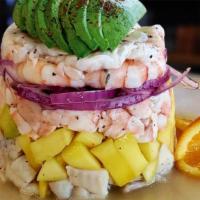 Mango Tower  · Fish and shrimp ceviche, cooked shrimp, fresh mango, red onion and avocado lime cured whole ...
