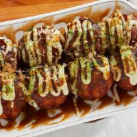 Takoyaki (7Pcs) · A ball-shaped snack made of wheat flour-based batter, minced octopus topped with takoyaki sa...