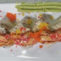 D · Shrimp tempura, eel, crab salad, cucumber, avocado covered with tempura flake, tobiko, eel s...