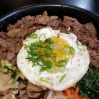 Bibimbop · Popular Korean mixed bowl dish that comes with steamed rice topped with seasoned assorted ve...