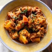 Aloo Gobi · Cauliflower and potatoes cooked with herbs and spices.