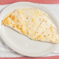 Quesadilla Flour · Just toasted tortillas with melted cheese, griddled with our special technique.