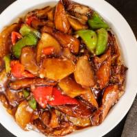 Di San Xian / 地三鲜 · Fried potato, green pepper, red pepper, and eggplant. / 炸土豆, 青椒, 红椒及茄子。
