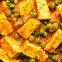 Mautter Paneer · Gluten free. Peas cooked with house made cheese with onion, tomato and spices.