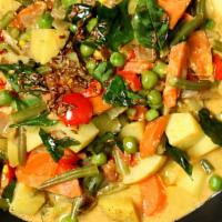 Vegetable Korma · Gluten free. Mixed vegetables cooked with cream, coconut, nuts and raisins.