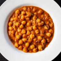 Chana Masala · Gluten free. Chickpeas cooked with curry sauce.