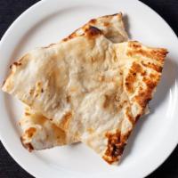 Naan · Regular dough made with fine flour, milk and spices.