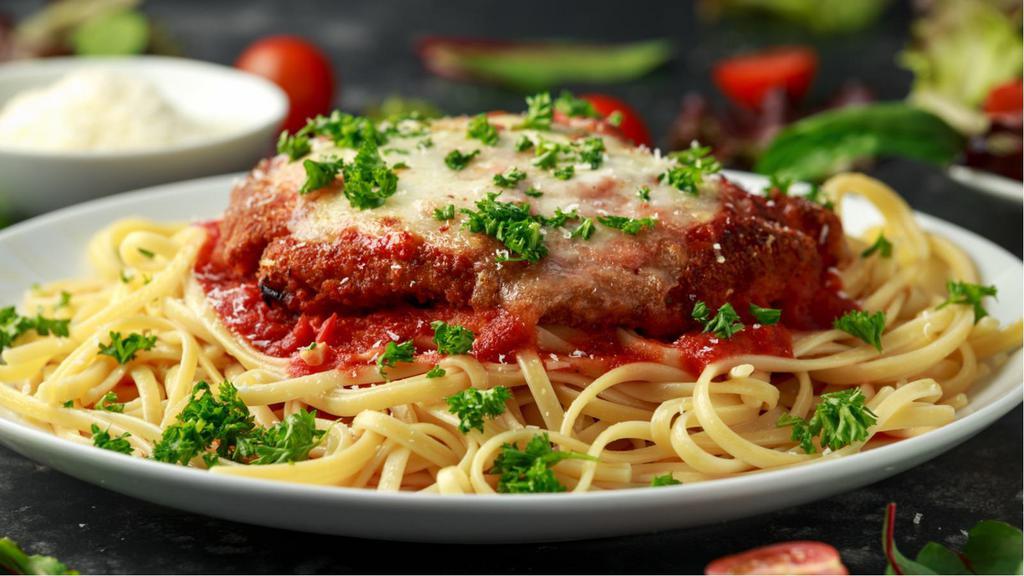 Chicken Parmesan With Spaghetti · Delicious spaghetti made with a marinara base and topped with Chicken Parmesan. Served with customer's choice of side.