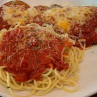 Eggplant Parmesan With Spaghetti · Delicious spaghetti made with a marinara base and topped with Eggplant Parmesan. Served with...