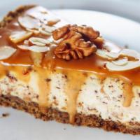 Caramel Fudge Cheesecake · Classic cheesecake with a rich, dense, smooth, and creamy consistency. Topped with a sweet, ...