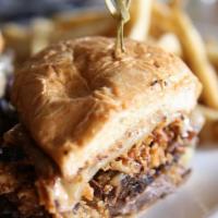 Apple Pie Sliders · Apple pie filling, brown sugar, Cheddar cheese and cinnamon butter baked bread.