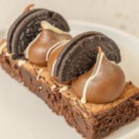 Brownie Bar · Dark chocolate Brownie Bar topped with Dulce de Leche