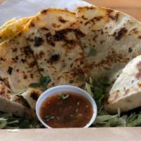 3 Cheese Quesadilla · Oaxaca, Cheddar and Monterey Jack cheeses with mild green chiles on a 14