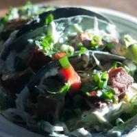 Yellowfin Tuna Tacos (Each) · Tamari marinated yellowfin tuna, shredded cabbage, house salsa, green chile crema, green oni...