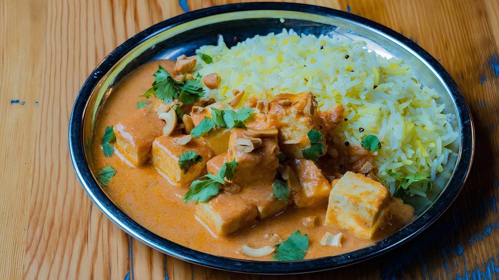 Paneer Makhani · House-made paneer in a rich tomato, cream, and cashew curry with spiced rice.