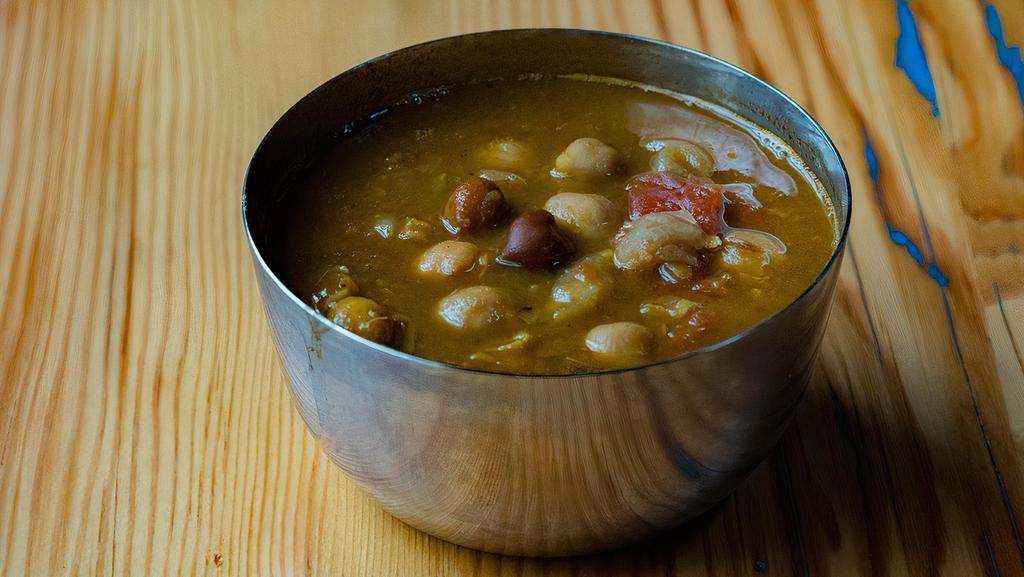 Chole · Spiced garbanzo bean stew.