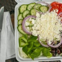 Greek Salad With Feta · Lettuce, tomatoes, cucumbers, red onions, green peppers, feta cheese and black olives topped...