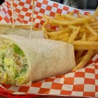 Chicken Caesar Wrap · Fried chicken romaine lettuce and parmesan cheese tossed in caesar dressing and wrapped in a...