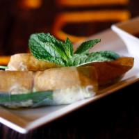 Spring Rolls Veggie · Fried tofu wrapped in rice paper with vermicelli, lettuce and mint. Served with peanut sauce...
