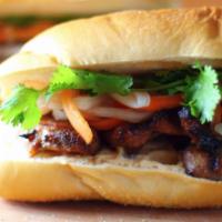 Banh Mi · Baguette sandwich with a choice of chicken, pork or beef. Sandwich has lettuce, cucumber, ma...
