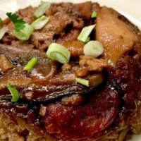 Sticky Rice · A dim sum favorite! Tender chicken, char siu (Chinese BBQ pork), mushroom, Chinese sausage, ...