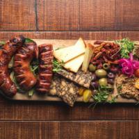 Brewer’S Board · three assorted Local craft sausages / farmer’s cheeses / bacon jam / olives/ walnuts / stone...