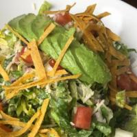 Off The Wall Caesar · Shredded romaine, parmesan cheese, red onions, diced tomatoes, avocado, tortilla strips and ...