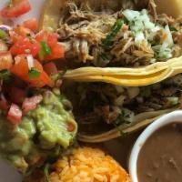 Taco Plate · Two tacos of your choice from any of the proteins below, with a side of pinto beans, Spanish...