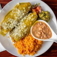 Tamales Plate · Your choice of two tamales (chicken, pork or poblano peppers and cheese) topped with your ch...