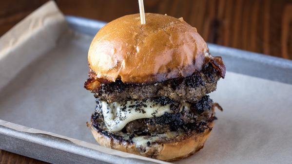 Steel · Double beef, bacon, American cheese, caramelized onions, aioli on brioche.
