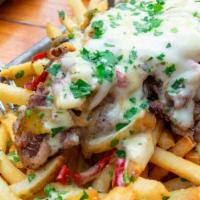 Loaded Philly Fries · Our PDX truffle fries topped with thin sliced NY strip grilled peppers and onions, white Ame...