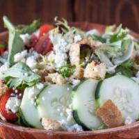 Mixed Greens · Mixed greens, tomatoes, cucumbers, blue cheese, croutons, balsamic dressing.