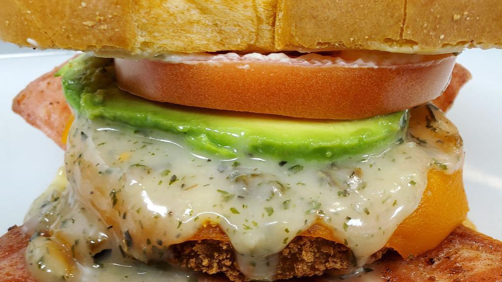 Savory Vegan Chicken Sandwich · Vegan Bacon, vegan chicken pattie, in-house vegan ranch sauce and vegan in-house mayo topped with tomato and avocado on vegan brioche bread
Of course you may add more bacon for a small upcharge