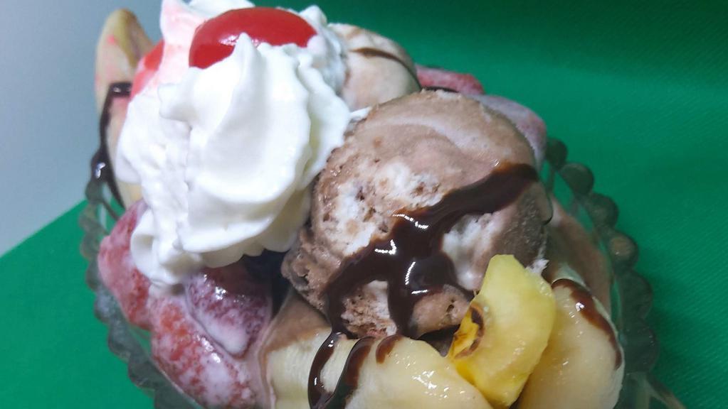 Sweet Split · Old fashion banana split -1 sliced banana with - 3 scoops of vegan gourmet ice cream topped with 3 of your favorite toppings, whipped cream, and a maraschino cherry.