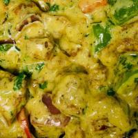 Chicken 999 · Chicken tastefully marinated and then tossed with Garlic, peppers,  onion and Chefs special ...